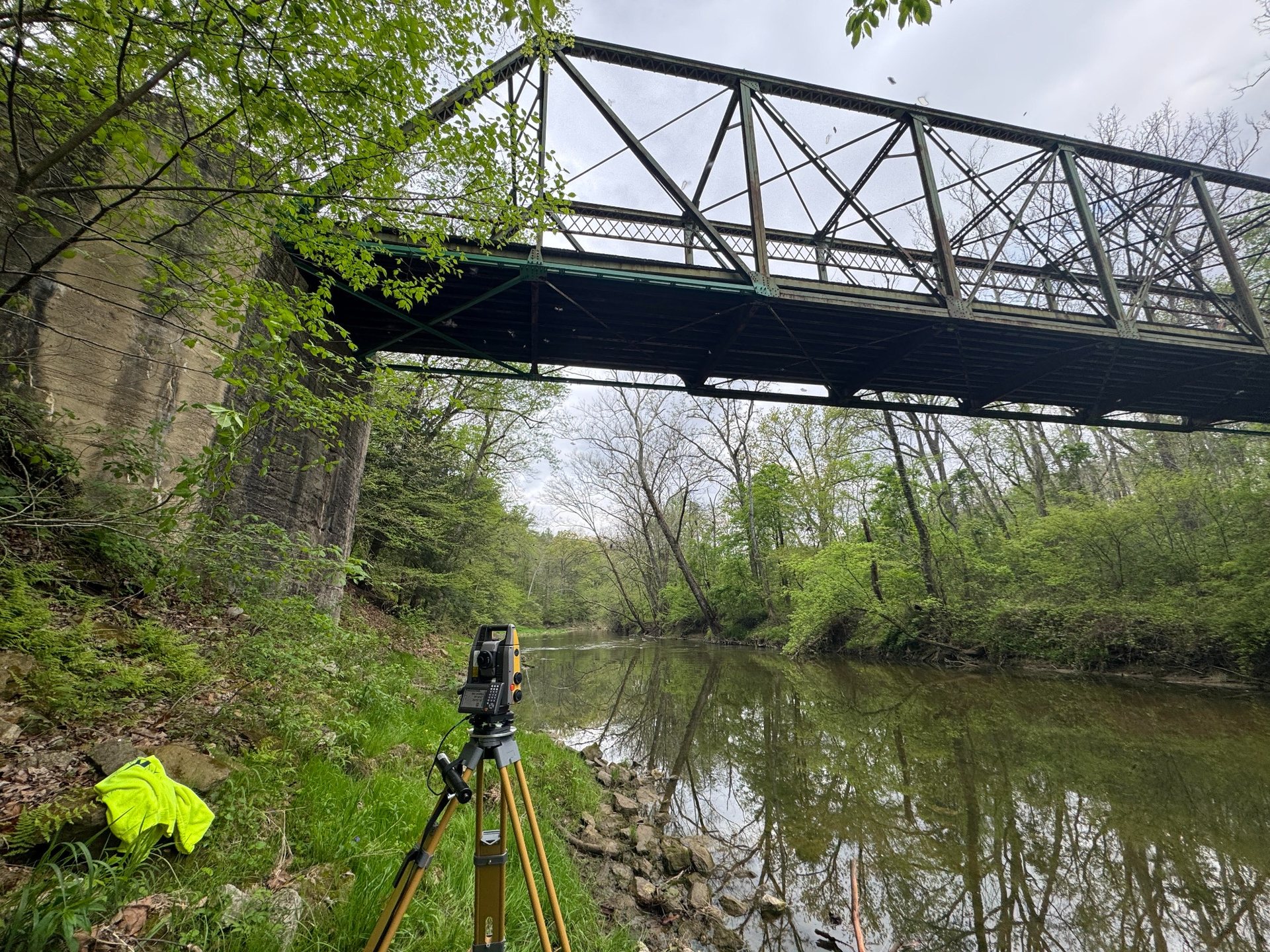 Survey equipment below a bridge